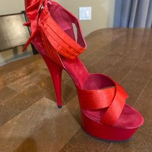 Size 8 Tall stilettos. 6in heel. Never worn RED